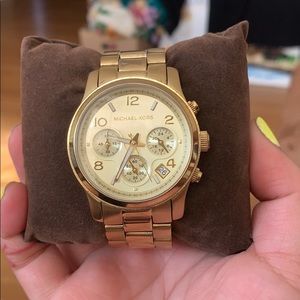 gold MK watch